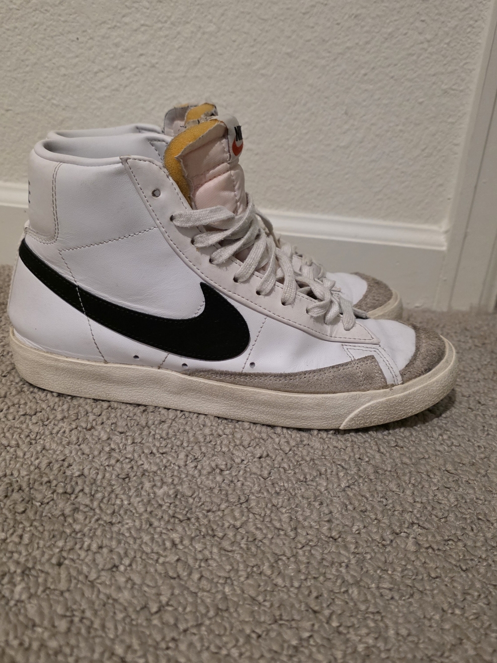 Nike White High-Top Sneakers with Black Swoosh and Gray Accents